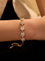 1 PC Gold Adjustable Floral Pearl Chain Bracelet With Sparkling Zirconia Stones - Image 6