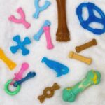 Nylabone Puppy Chew Teething Ring Bone Dog Toy, Chicken Flavor, X-Small | Soothi... - Image 8